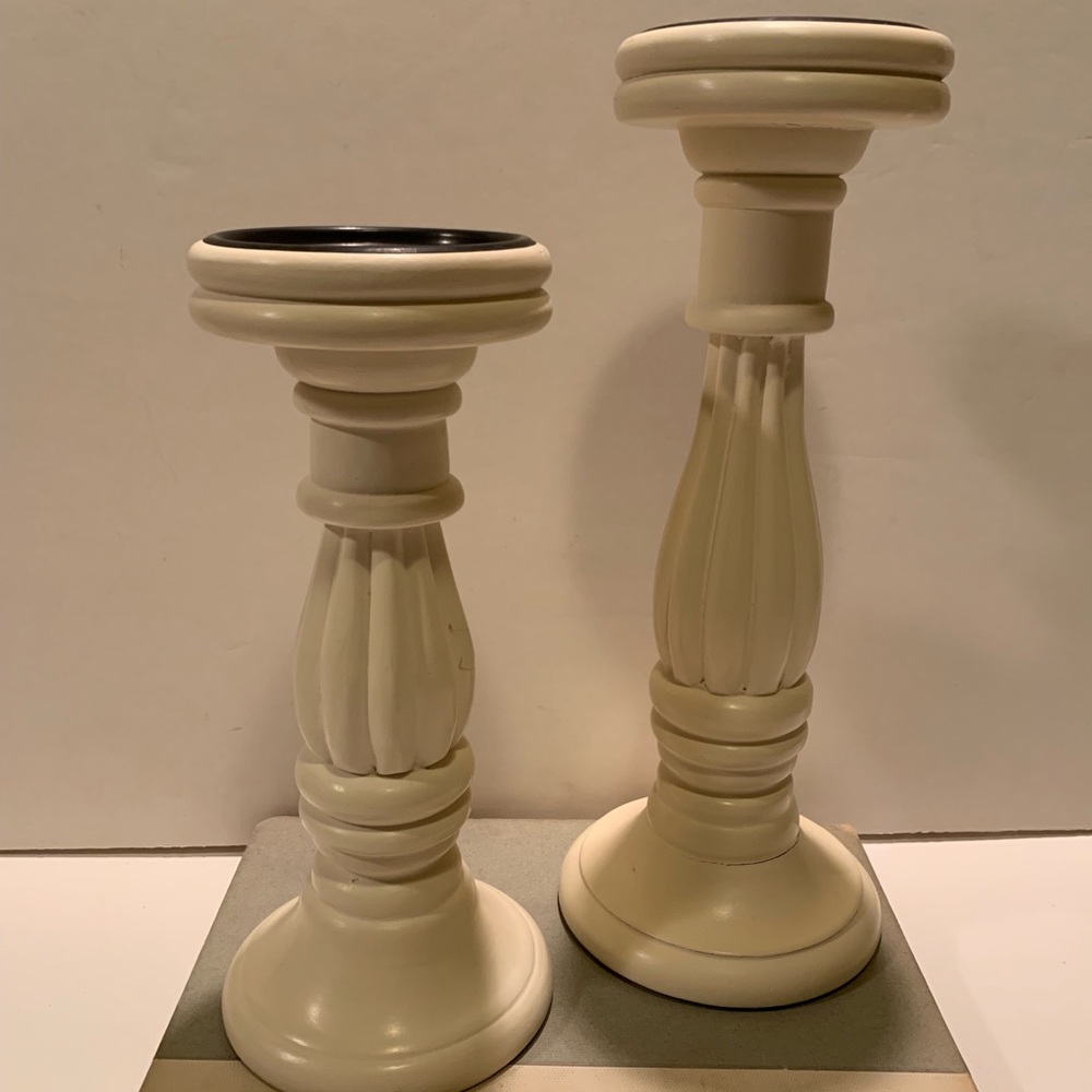 TARGET SET OF 2 CREAM/ OFF WHITE CANDLE HOLDERS.